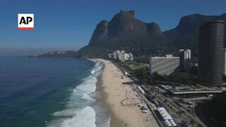 Volunteers clean Rio beach on Oceans Day