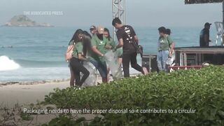 Volunteers clean Rio beach on Oceans Day