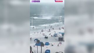 Waterspout causes chaos on Florida beach and injures two