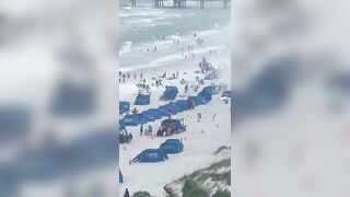 Waterspout causes chaos on Florida beach and injures two