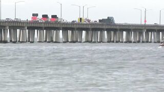 Coast Guard searches for 1 person after tractor-trailer drives off Chesapeake Bay Bridge-Tunnel