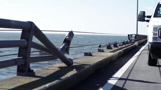 Coast Guard searches for 1 person after tractor-trailer drives off Chesapeake Bay Bridge-Tunnel