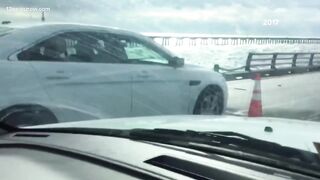 Coast Guard searches for 1 person after tractor-trailer drives off Chesapeake Bay Bridge-Tunnel