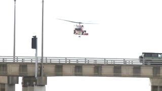 Coast Guard searches for 1 person after tractor-trailer drives off Chesapeake Bay Bridge-Tunnel