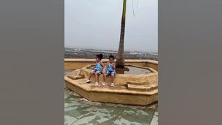 Cute baby on beach | Dhruhi & Dhruvi | #shortsfeed #shortsvideo #cute #viral #trending #shorts