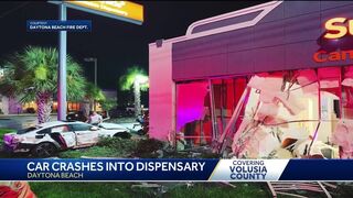 Video shows car crashing into Daytona Beach business