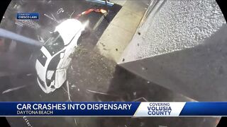 Video shows car crashing into Daytona Beach business