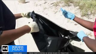 Summercampers and Miramar police participate in beach clean-up