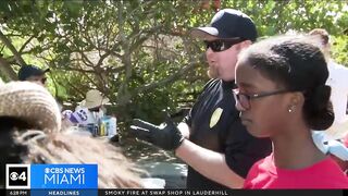 Summercampers and Miramar police participate in beach clean-up