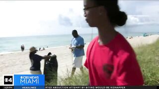 Summercampers and Miramar police participate in beach clean-up