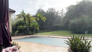 Funny Great Dane reluctantly gets wet in beautiful Florida sun shower