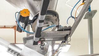 Nestlé Singapore Improves Metal Detection with Flexible Screw Conveyor