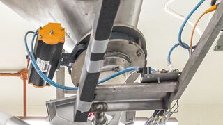 Nestlé Singapore Improves Metal Detection with Flexible Screw Conveyor