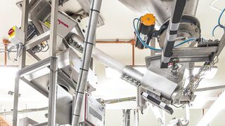 Nestlé Singapore Improves Metal Detection with Flexible Screw Conveyor