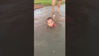 The whole family goes to the stream to cool off in the summer