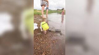 The whole family goes to the stream to cool off in the summer