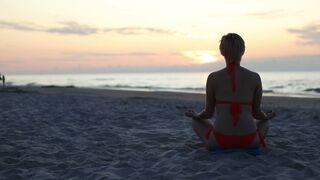 Hotgirl wearing a red bikini is meditating on the beach in lotus position ???? Bra Panties Try On Haul