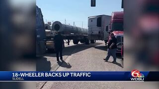 Trailer falls from semi-truck causes "cluster" in Slidell
