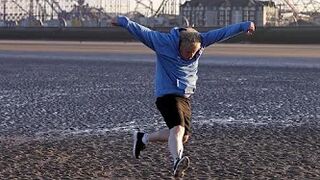 Boris running on Blackpool beach with added Baywatch theme.