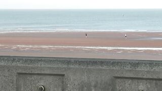 Boris running on Blackpool beach with added Baywatch theme.