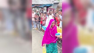 Funny challenge of throwing ball. Village Women winning useful Rewards