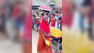 Funny challenge of throwing ball. Village Women winning useful Rewards