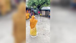 Funny challenge of throwing ball. Village Women winning useful Rewards