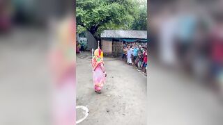 Funny challenge of throwing ball. Village Women winning useful Rewards