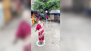 Funny challenge of throwing ball. Village Women winning useful Rewards