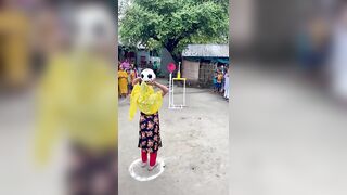 Funny challenge of throwing ball. Village Women winning useful Rewards