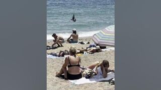 ???????? Sun bath at Barcelona beach