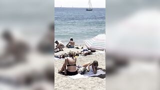 ???????? Sun bath at Barcelona beach