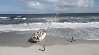 Man with boat stuck on Jacksonville Beach says he was robbed, is having trouble getting tow