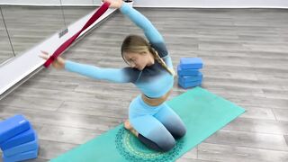 Leg-split stretching with gymnastic elastic band. Yoga exercises for legs & feet. Split & oversplit