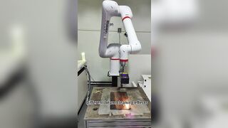 Maven Cooperation Robot arm working with laser cleaning system ,flexible and high precision way.