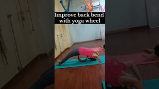 Improve back bend with yoga wheel #yoga #trendingreels #youtubeshorts #shorts