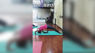 Improve back bend with yoga wheel #yoga #trendingreels #youtubeshorts #shorts