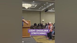 ECE Teacher light shoulder stretching!