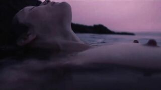 Nude, cold-water swimming with British model Vivien Solari