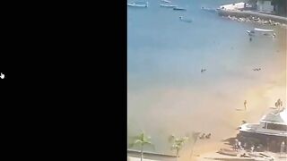 Shootout On Beach In Front Of Tourists In Acapulco @ playa Manzanillo