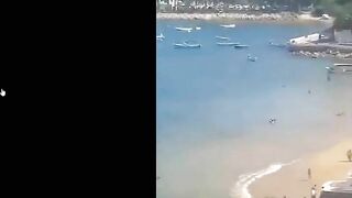 Shootout On Beach In Front Of Tourists In Acapulco @ playa Manzanillo