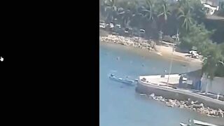 Shootout On Beach In Front Of Tourists In Acapulco @ playa Manzanillo