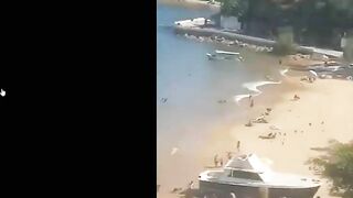 Shootout On Beach In Front Of Tourists In Acapulco @ playa Manzanillo