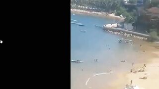 Shootout On Beach In Front Of Tourists In Acapulco @ playa Manzanillo