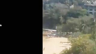 Shootout On Beach In Front Of Tourists In Acapulco @ playa Manzanillo